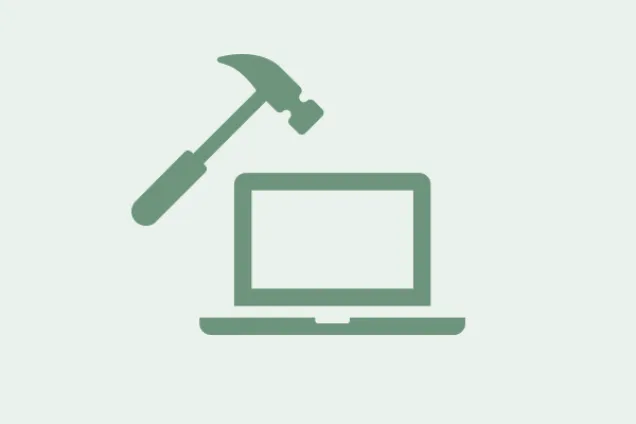 hammare och laptop. ikon. 